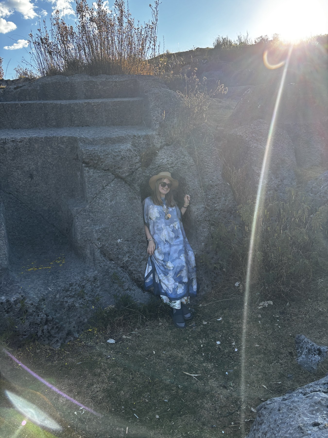 Georgia James standing in prismatic light during her spiritual travels